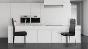 Zestaw krzeseł do jadalni salonu z ekoskóry 4 sztuki wysokie oparcie czarne ModernHome ModernHome