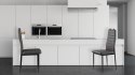 Zestaw krzeseł do jadalni salonu z ekoskóry 4 sztuki wysokie oparcie szare ModernHome ModernHome